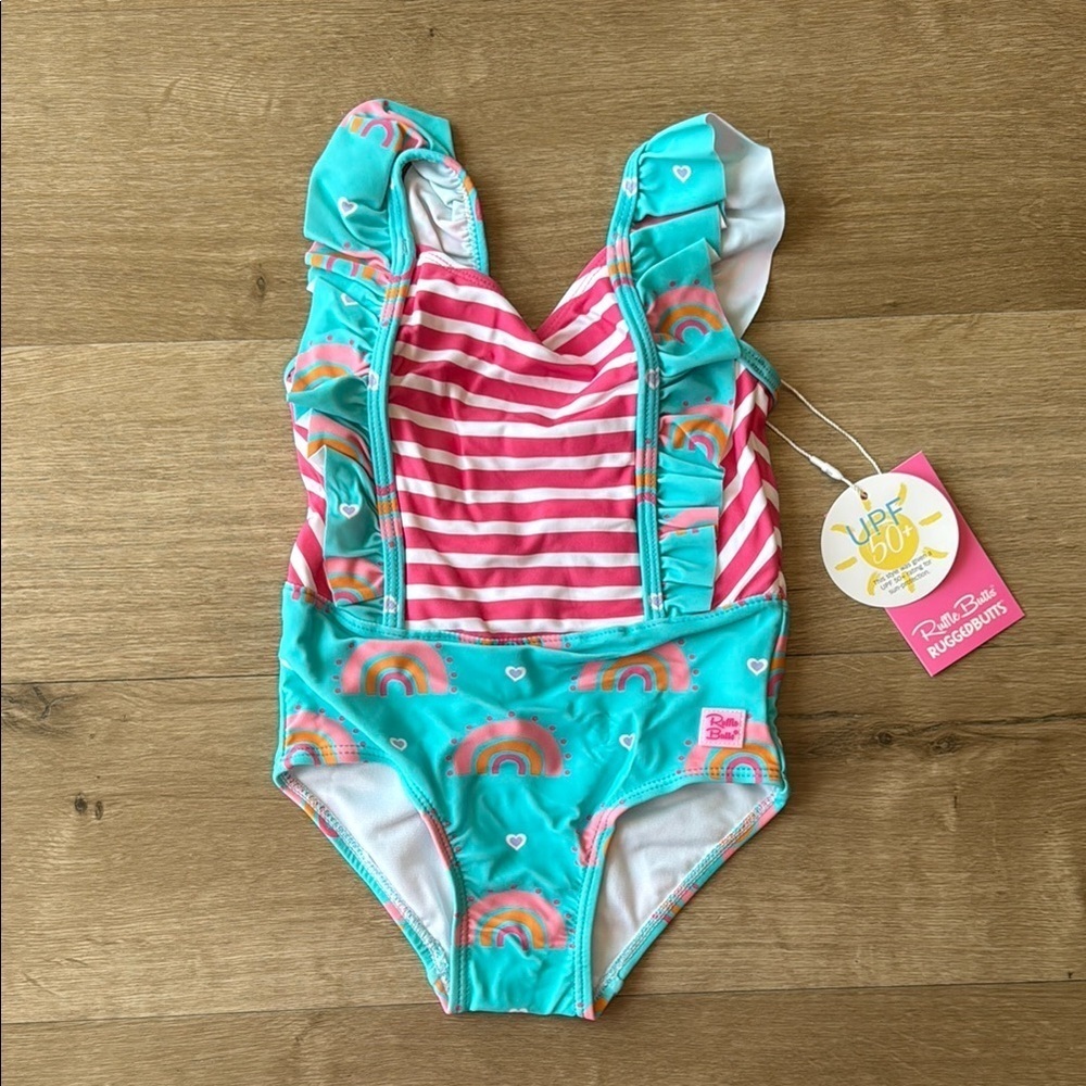 Ruffle Butts Swimming Suit.  Girl’s size 2T. New with tags. One piece.